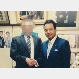 腐敗は拡大（左が一色氏）／（提供写真）