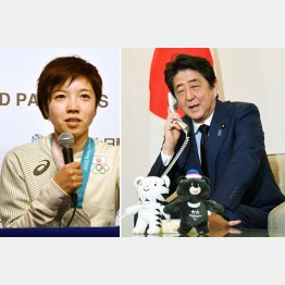 小平選手（左）を電話で祝福する安倍首相／（Ｃ）共同通信社