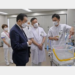 コロナ患者受け入れ施設で「聞く力」をアピール(C)共同通信社